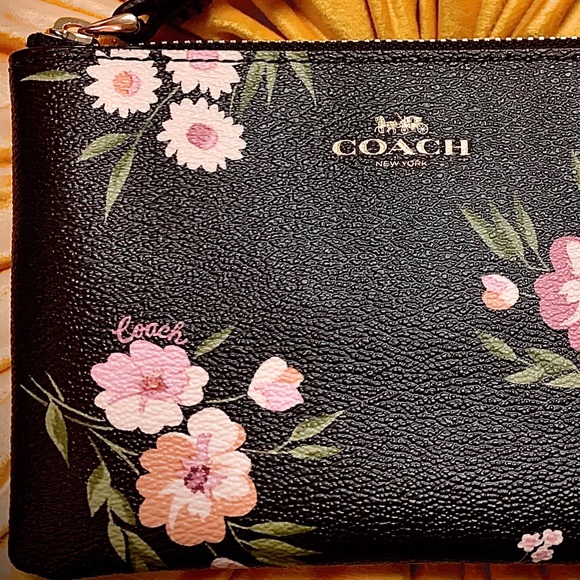 Coach Handbags - Coach | “Daisies” zipper Wristlets